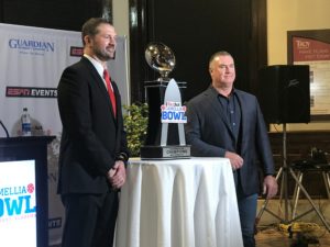 Head coaches with trophy
