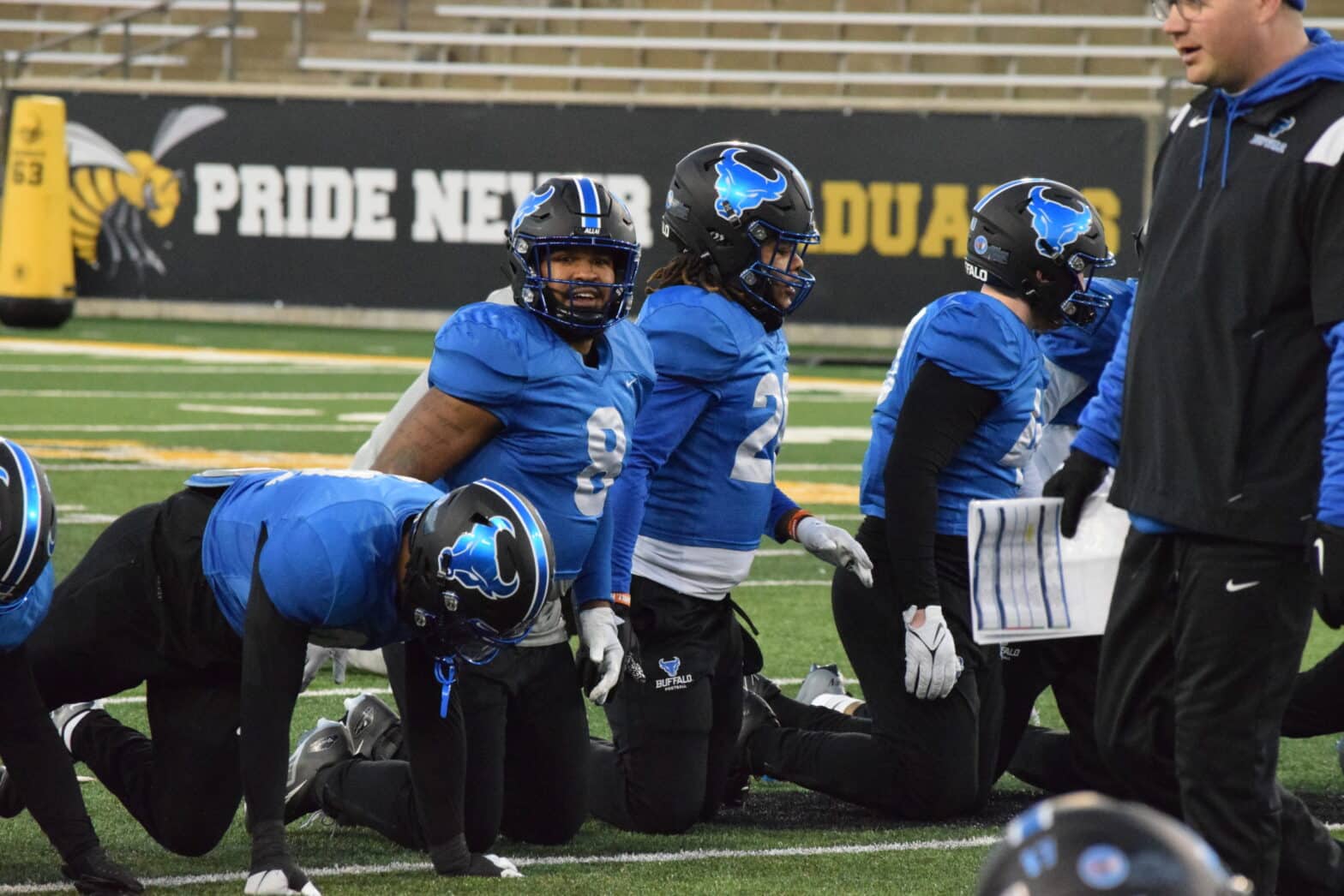 James patterson stretching with teammates3